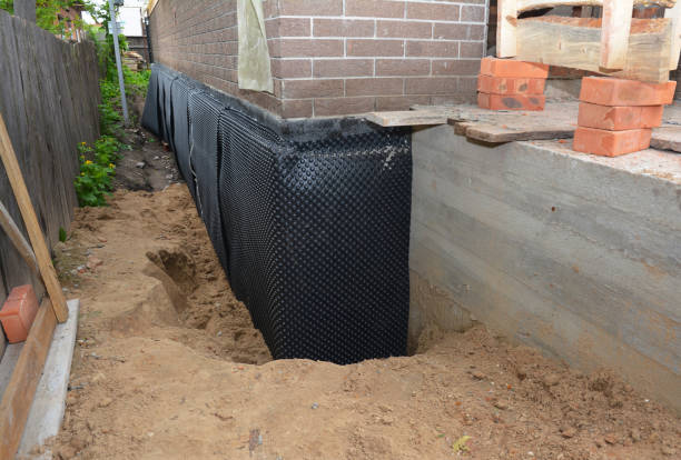 Happy homeowners after waterproofing job in Old Bridge